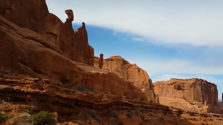 Dramatic red rock canyon formations at golden hour